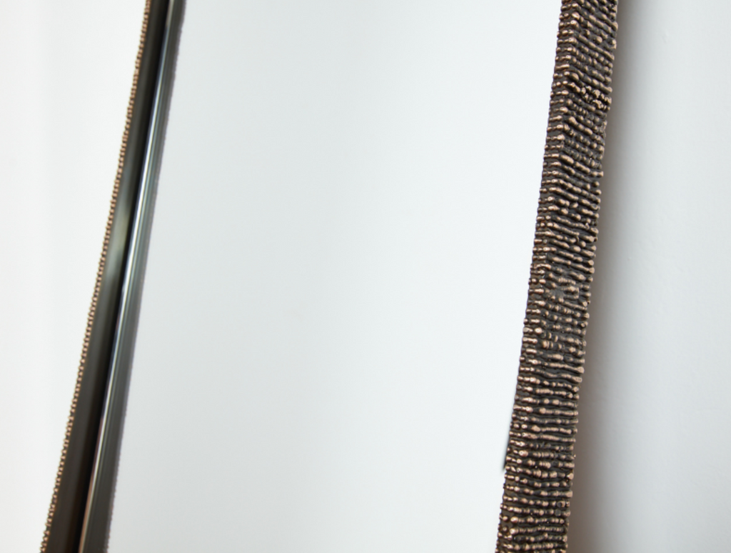 Elongated Molten Mirror