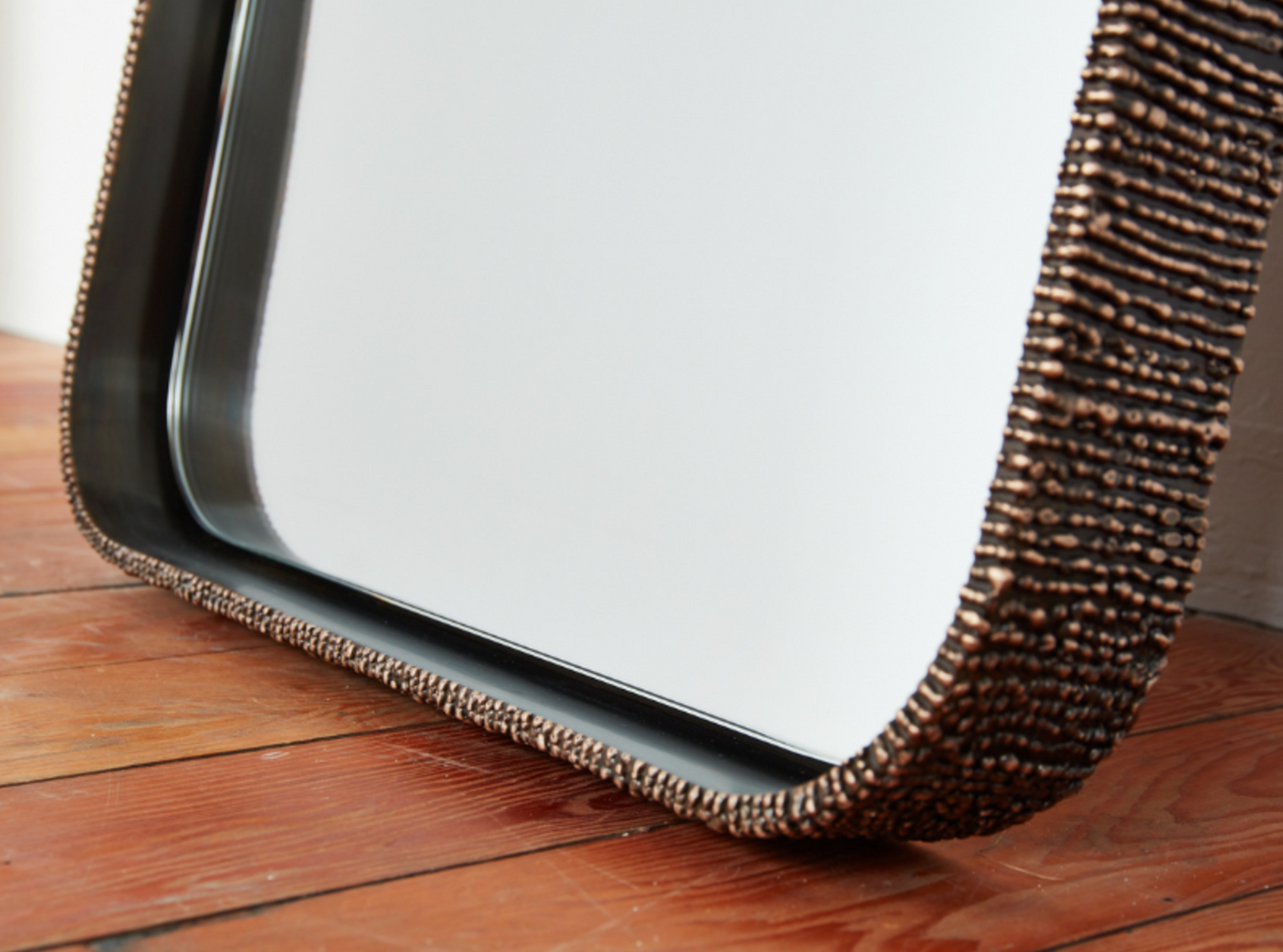 Elongated Molten Mirror